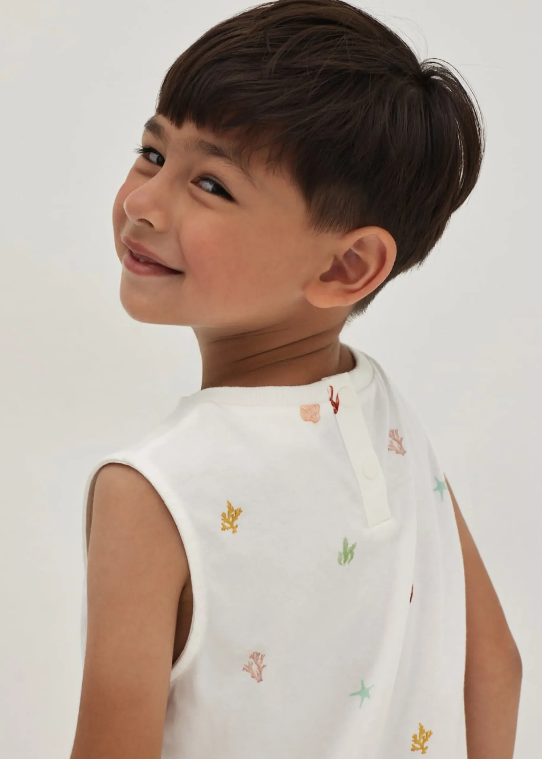 Brucie Unisex Jersey Tank Top in Tidal Daydream