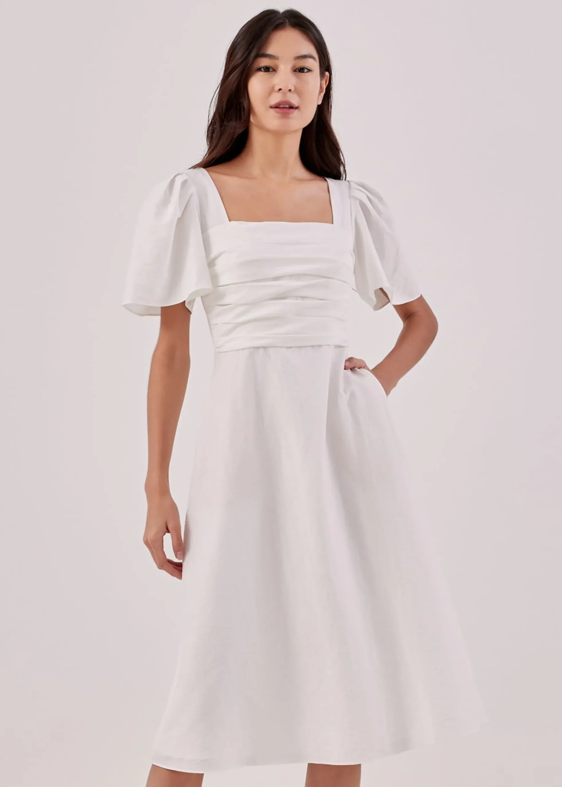 Kavena Textured Pleat Front Dress
