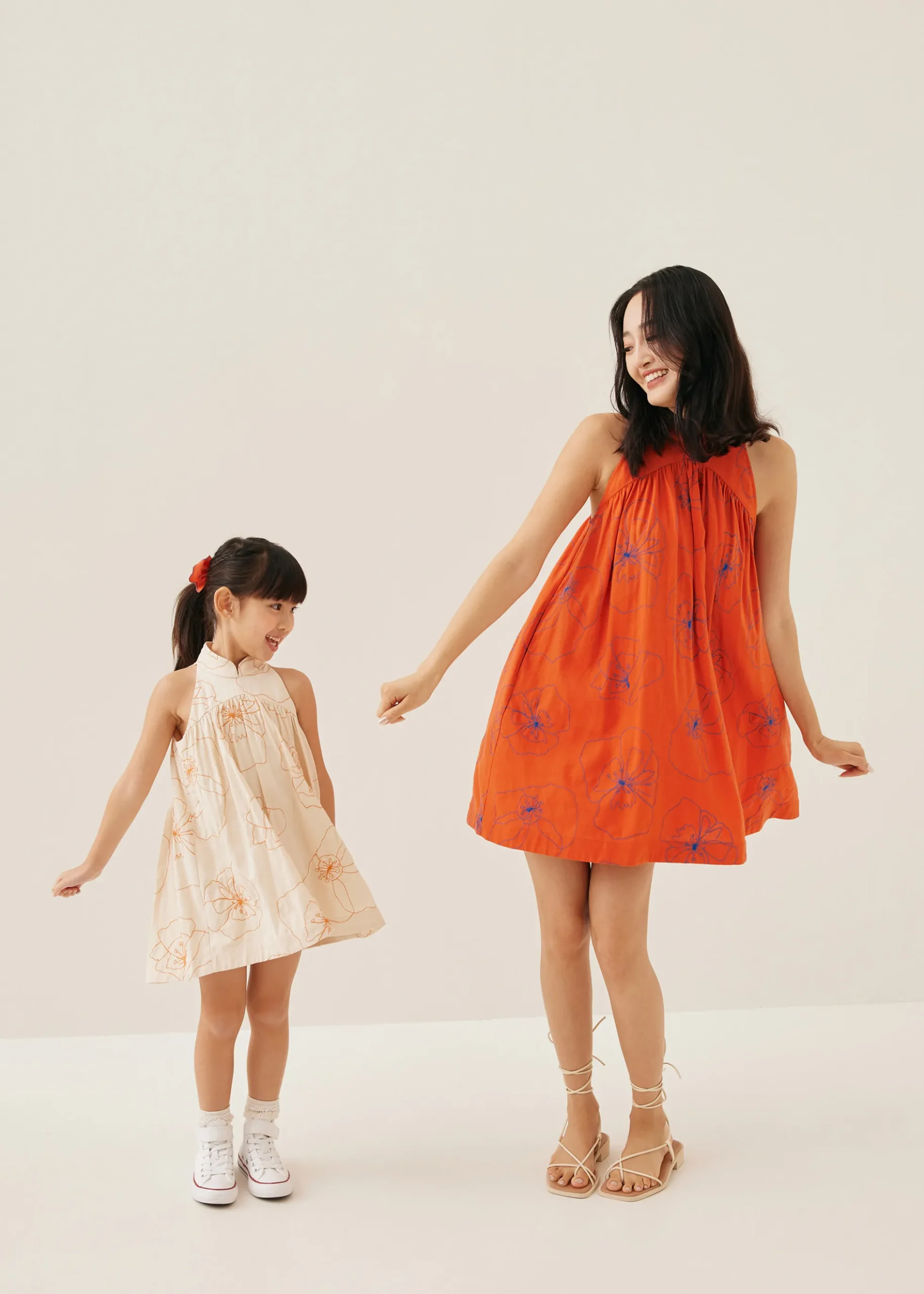 Melati Embroidered Babydoll Mini Dress in Rekindled Blooms